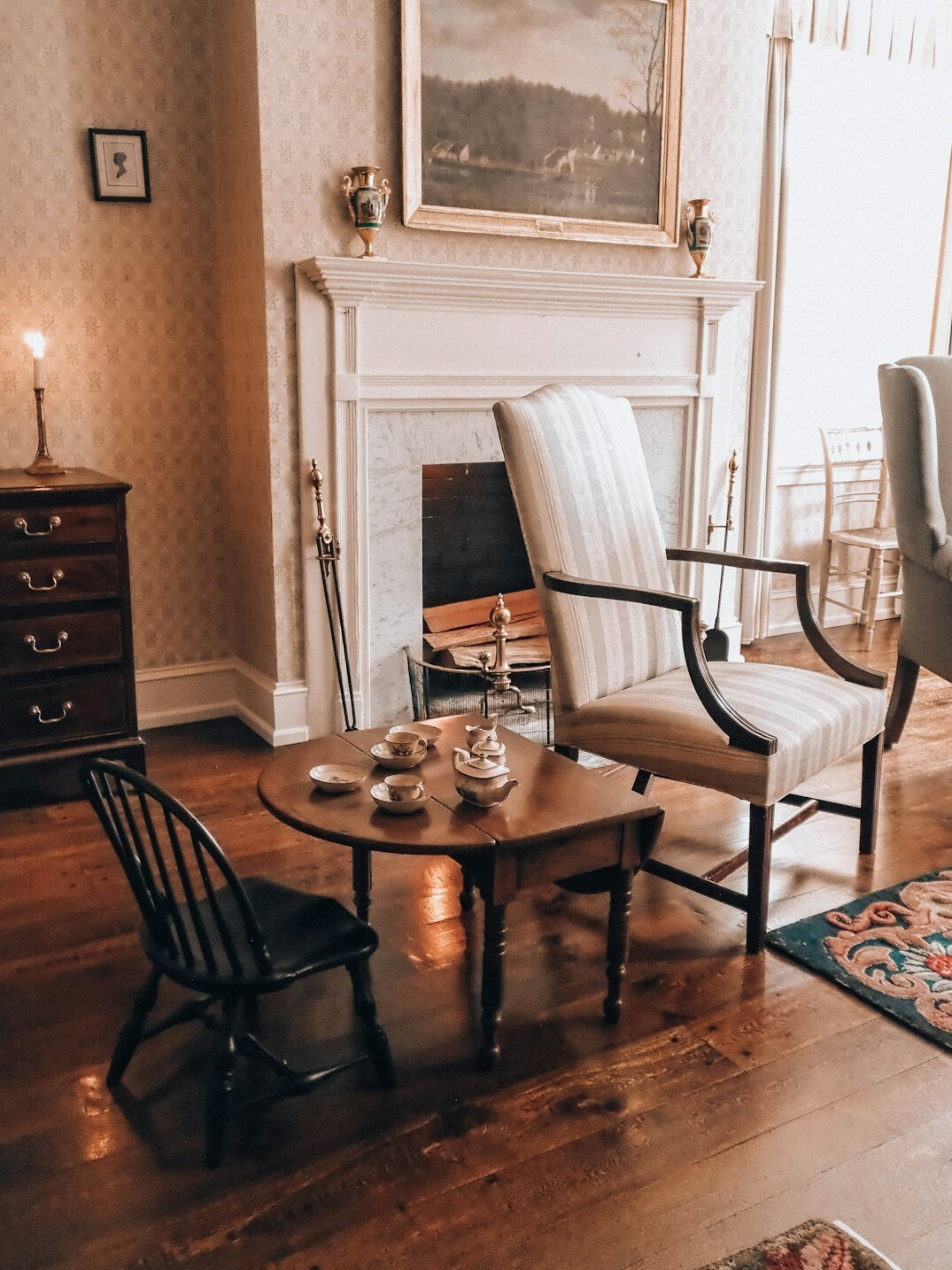 Senior women chatting over tea in a cozy living room