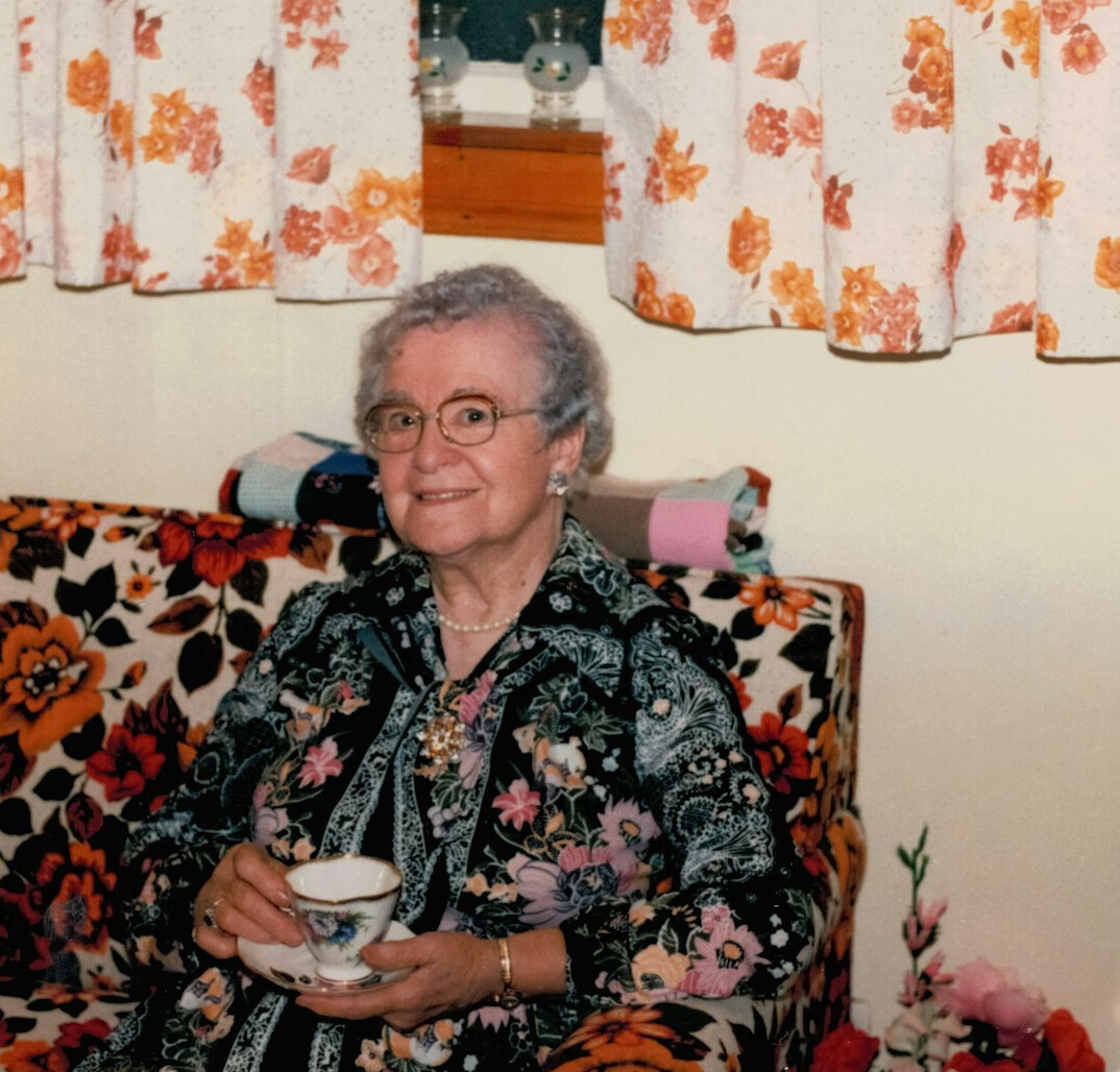 Portrait of a smiling senior woman with a floral blouse