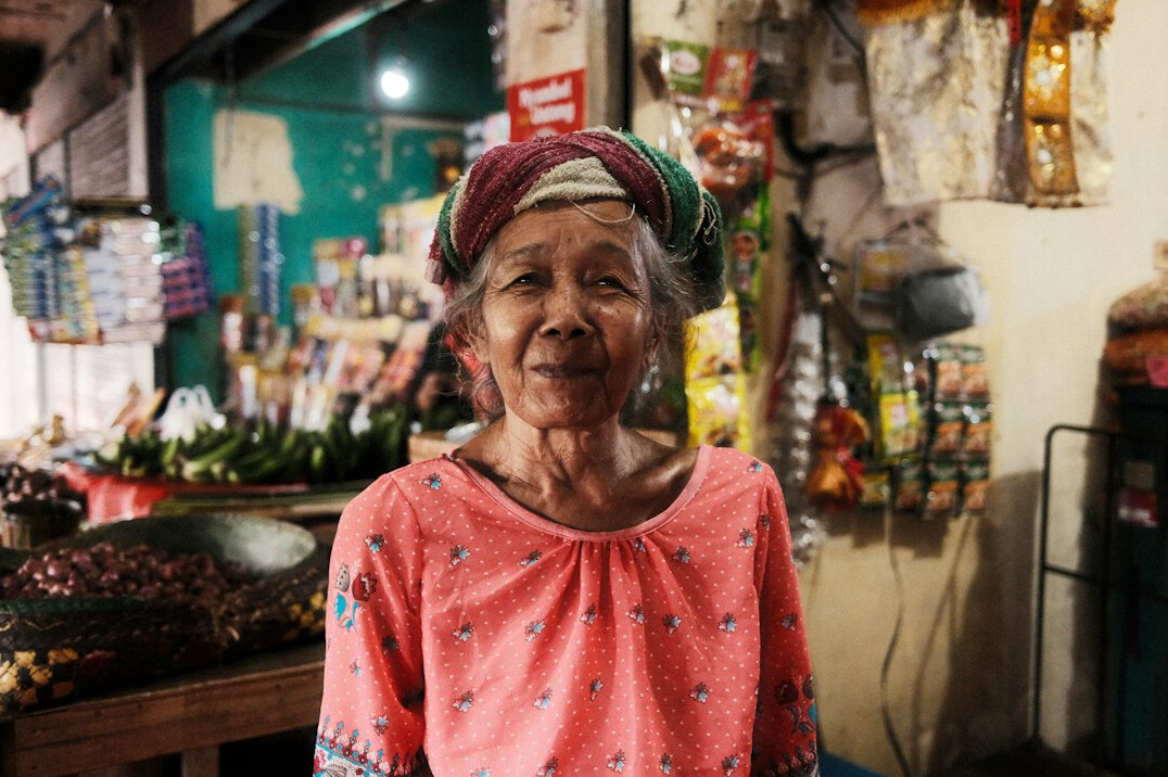 Portrait of a smiling senior woman with short grey hair
